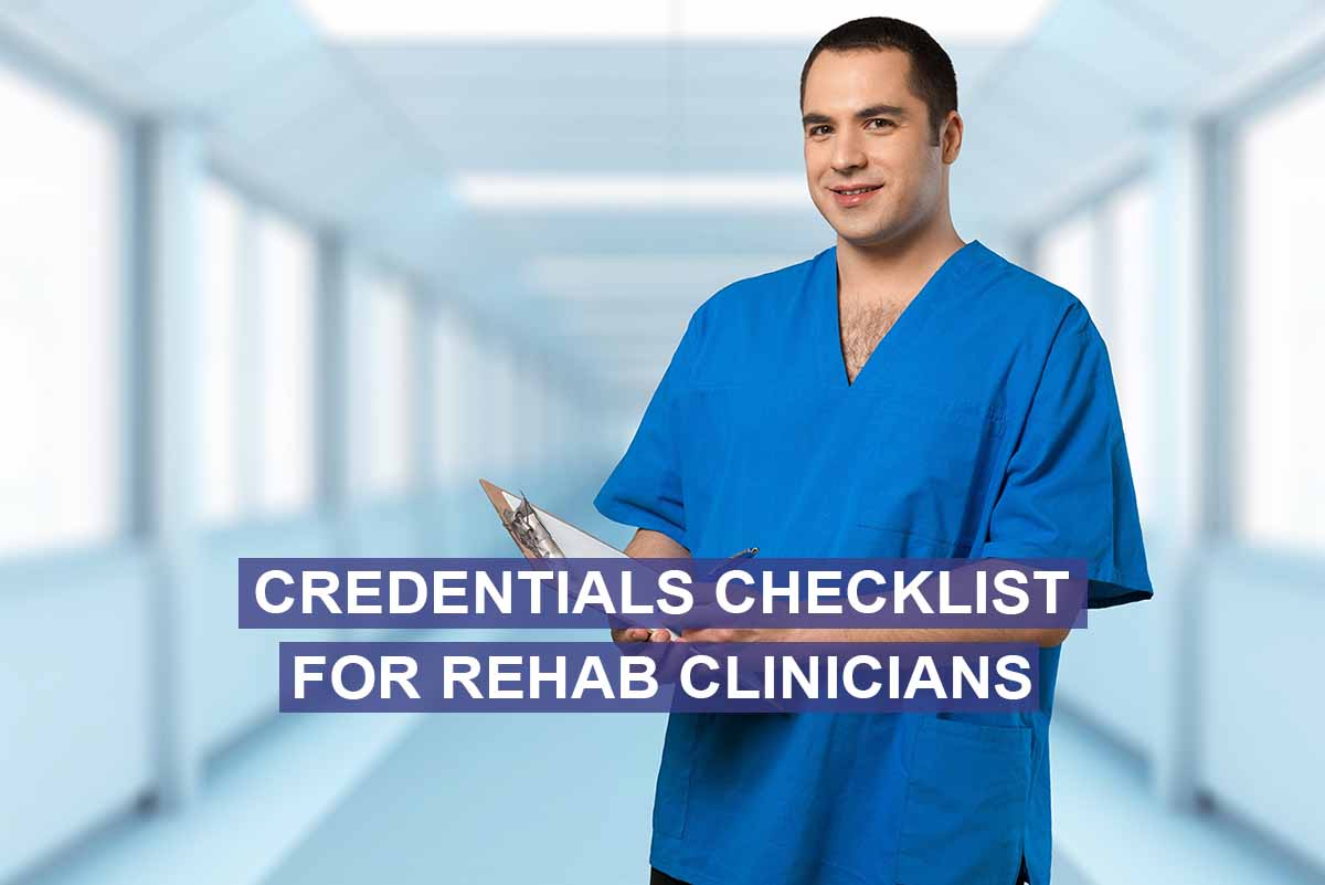 male healthcare worker in blue scrubs holding a clipboard